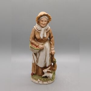 Charming Brown and Cream Figurine with Basket